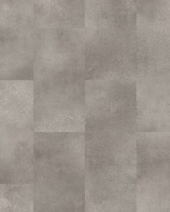 Vinyylilaatta Quick-Step Oro Concrete Rock asennettuna modernin kodin lattialle – vaaleanharmaa betonisävy ja selkeä, teollishenkinen betonikividesign.