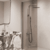 Folding shower screen Hietakari Forma 303, aluminium frame, bronze tinted glass Folding shower screen Hietakari Forma 303, aluminium frame, bronze tinted glass
