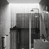 Curved folding shower screen with fixed part Hietakari Infinia 225, aluminium frame, grey tinted glass Curved folding shower screen with fixed part Hietakari Infinia 225, aluminium frame, grey tinted glass