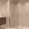 Partially framed fixed shower screen Hietakari Vetro 502, brass fittings, satin frosted glass