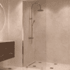 Partially framed fixed shower screen Hietakari Vetro 502, brass fittings, super bright glass