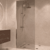 Framed shower screen with fixed part Hietakari Vetro 517, brass fittings, grey tinted glass