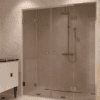 Alcove shower screen Hietakari Vetro 553, brass fittings, bronze tinted glass Alcove shower screen Hietakari Vetro 553, brass fittings, bronze tinted glass