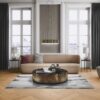 Классическая гостиная с ёлочным паркетом из дуба Rustic шириной 140 мм, покрытым натуральным маслом. Интерьер оформлен в утонченном стиле: бежевый диван, кресло с бордовой подушкой, массивный журнальный стол из чёрного мрамора, тёмные шторы и высокие белые окна с видом на город. Светлый ковёр и декоративные элементы добавляют уюта и элегантности пространству. Herringbone flooring Oak Mix oil-waxed 140 mm – 10
