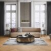 Классическая гостиная с ёлочным паркетом из дуба Rustic шириной 140 мм, покрытым натуральным маслом. Интерьер оформлен в утонченном стиле: бежевый диван, кресло с бордовой подушкой, массивный журнальный стол из чёрного мрамора, тёмные шторы и высокие белые окна с видом на город. Светлый ковёр и декоративные элементы добавляют уюта и элегантности пространству. Ёлочный паркет дуб Rustic 140 мм, масляное покрытие, классическая гостиная